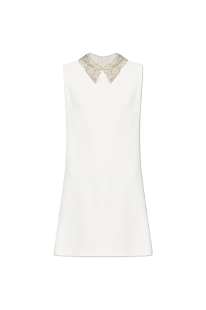 Dress with shimmering appliqués on the collar