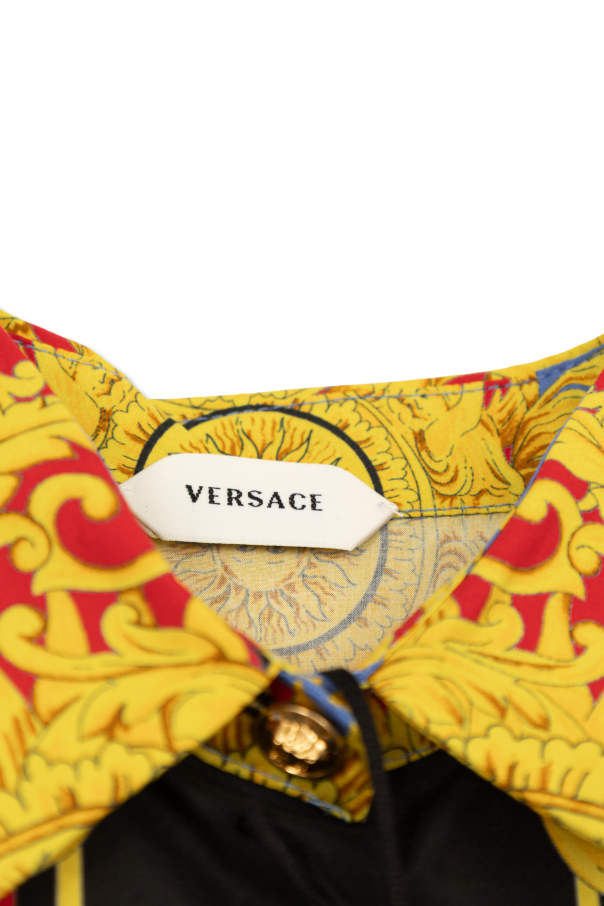 Versace Kids Dress with "The Sun Baby" print