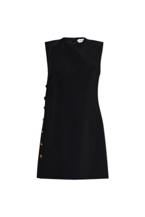 Dress with decorative side buttons