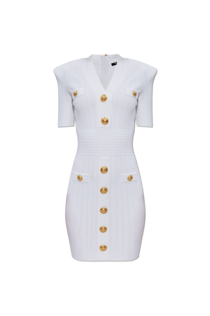 Dress with decorative buttons