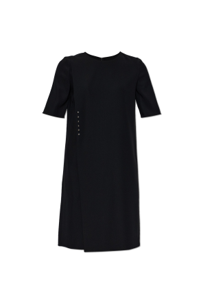 Dress with a pleat
