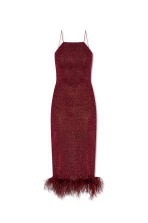 Dress finished with ostrich feathers