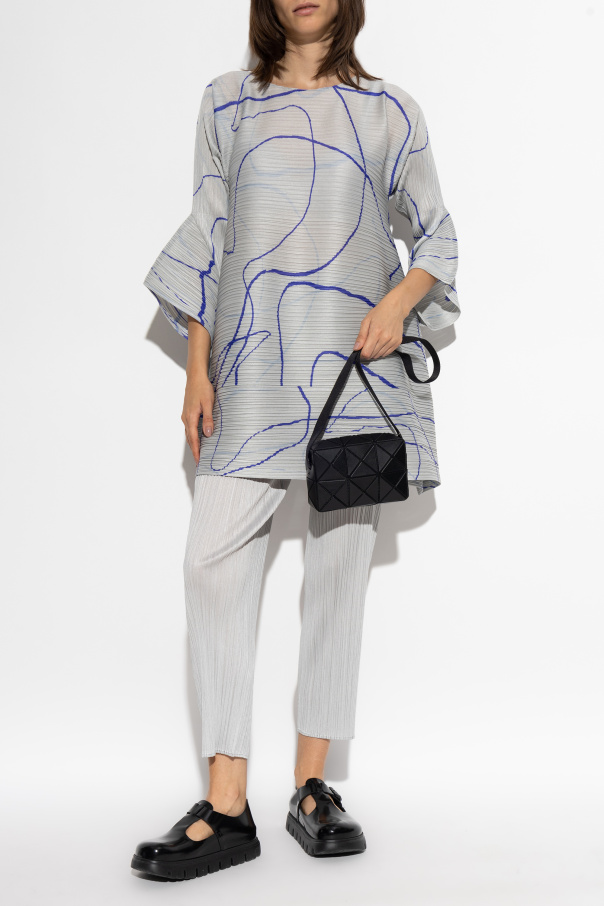 Pleats Please Issey Miyake Pleated dress with an asymmetric cut