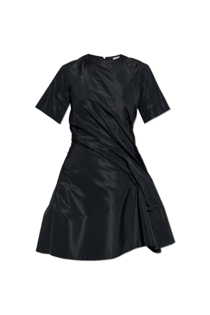 Dress with decorative draping