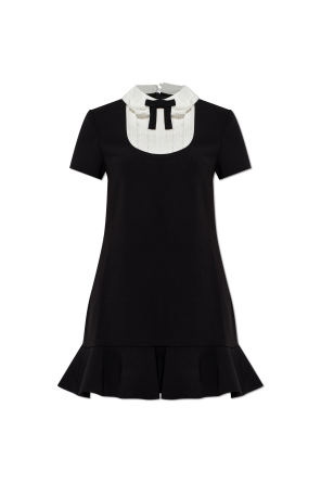 Dress with a frill
