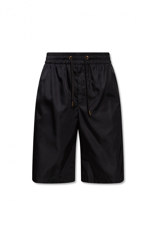 Versace shorts que with multiple pockets
