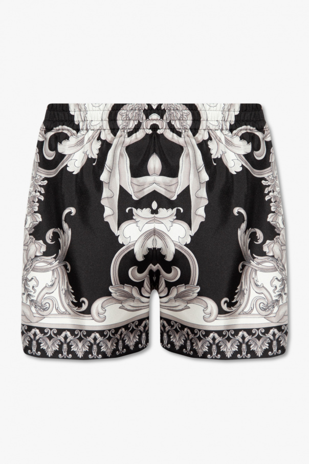 Versace Masters the Big Toe Sandal Trend in Metallic Mules & a Boyfriend-Style Shirt Dress