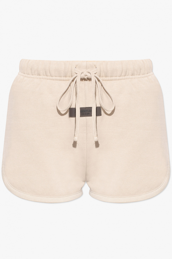 Fear Of God Essentials shorts layered with logo