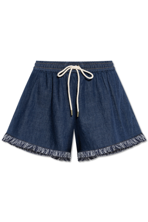 Denim shorts with fringes