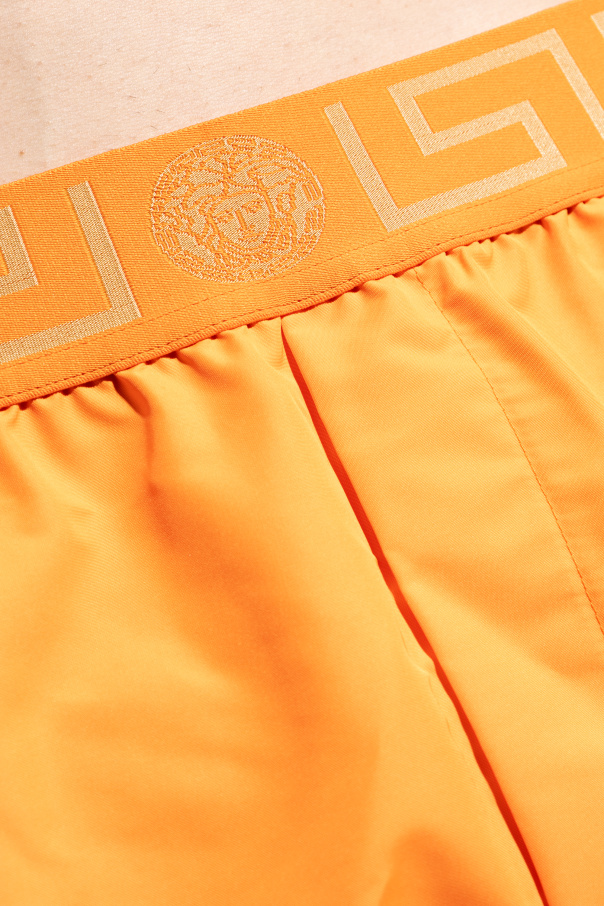 Versace Swim above shorts with logo