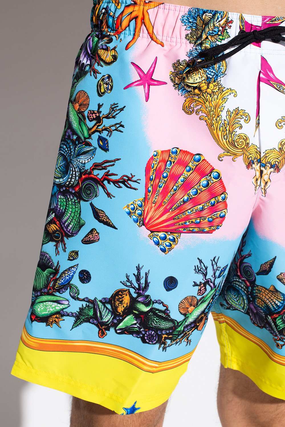 Logo-printed swim shorts in multicoloured - Versace