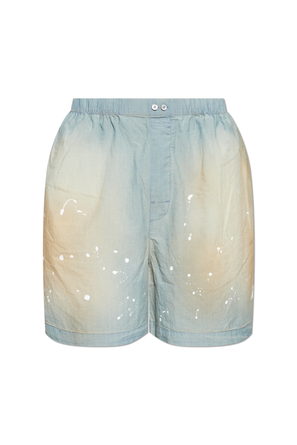 Shorts with a paint splatter effect od Acne Studios