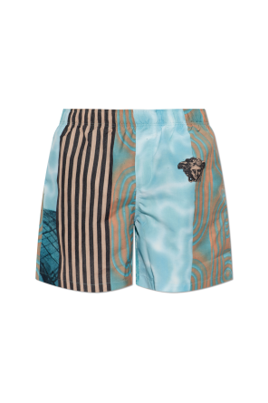 Swim shorts with "Floating by" print