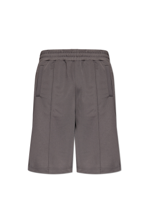 Pantalones cortos con pespuntes en las perneras