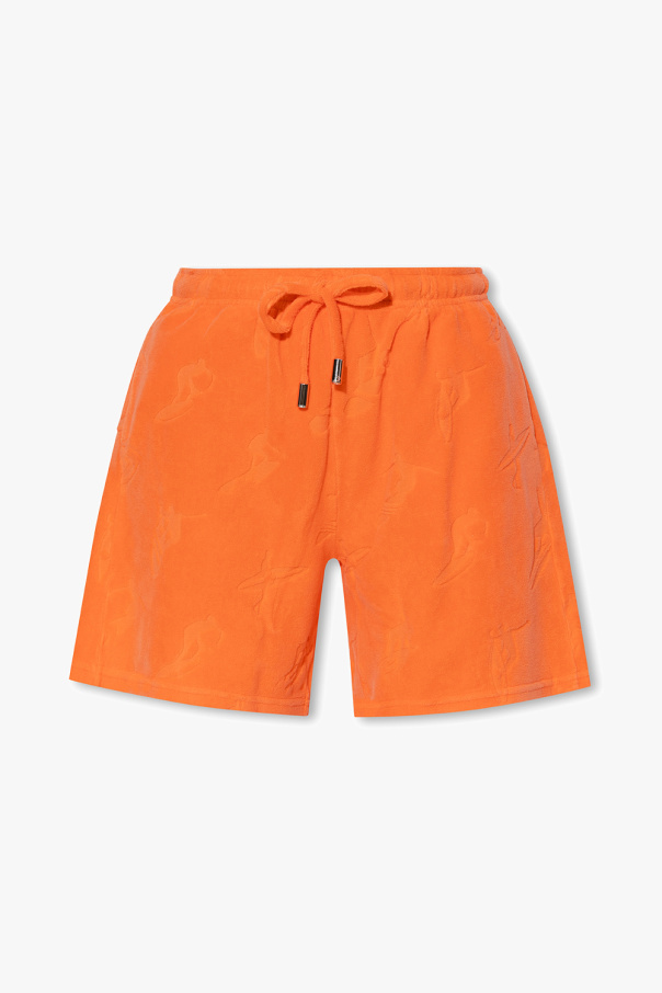Dsquared2 wearing shorts with logo
