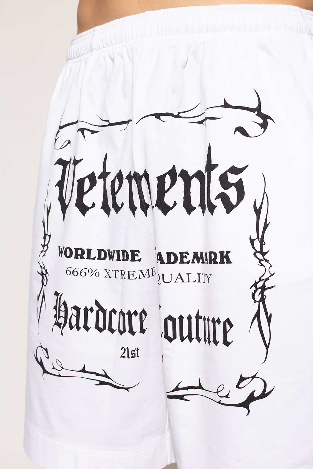 VETEMENTS shorts asymmetric with logo