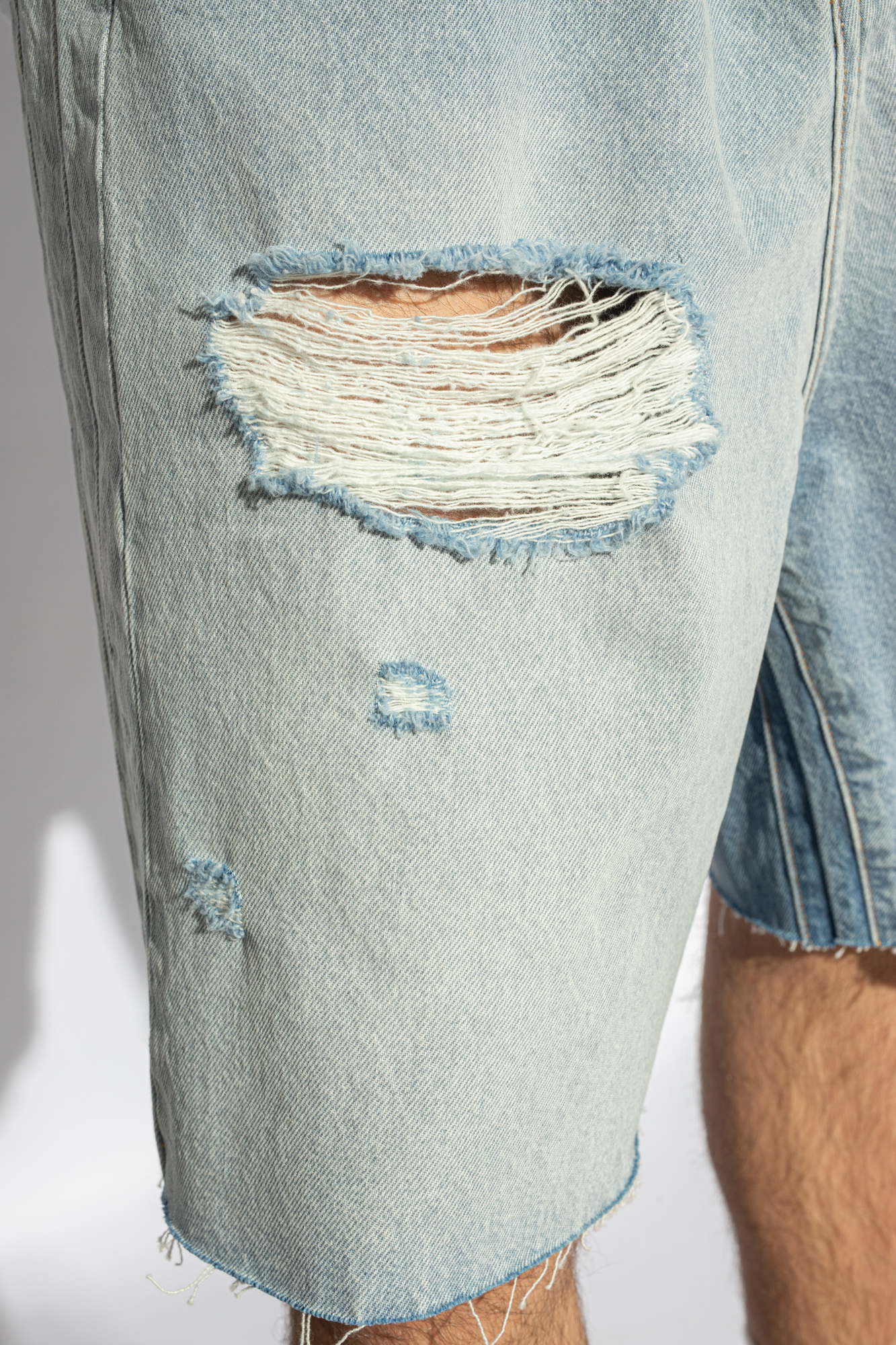 VETEMENTS Distressed denim shorts