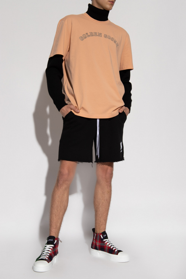 Amiri Nike Boyfriend T-shirt met mini swoosh in lichtroze