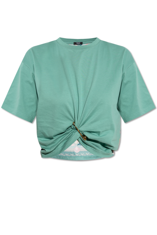 Top with a decorative safety pin od Versace