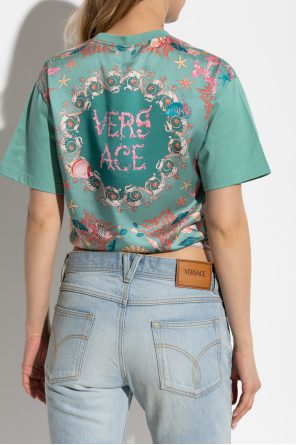 Versace Top con imperdible decorativo