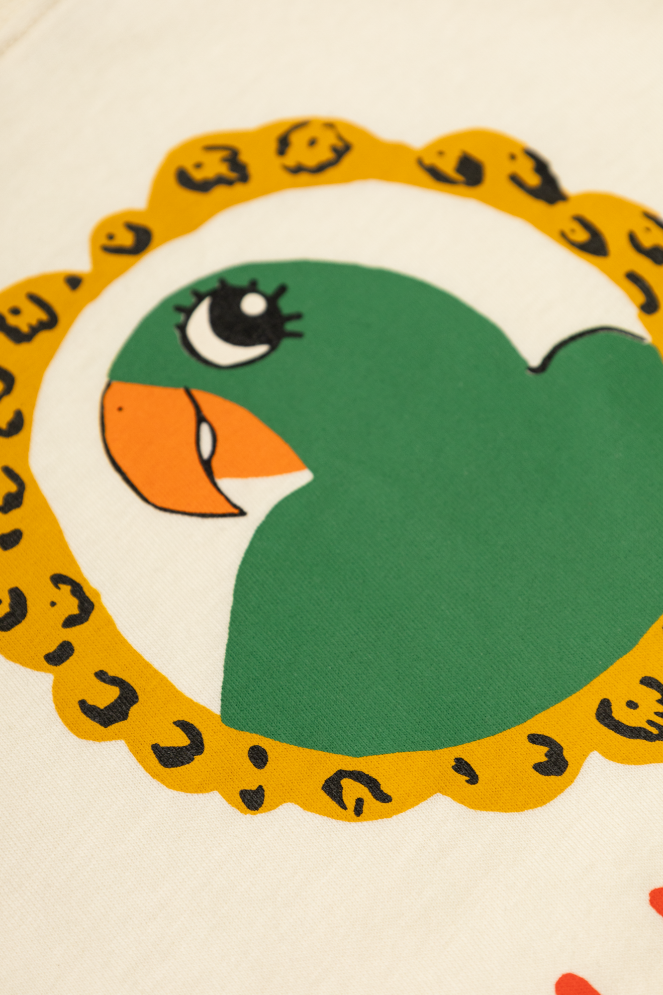 Mini Rodini T-shirt with a parrot motif