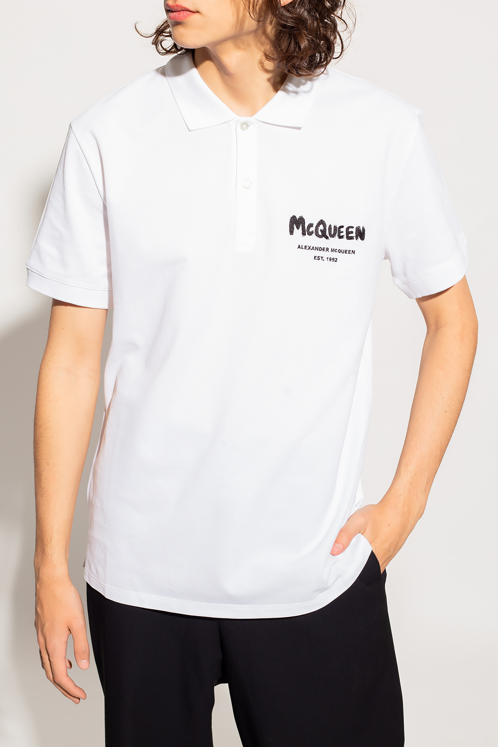 Alexander McQueen Polo de piqué de corte slim en negro de Lacoste