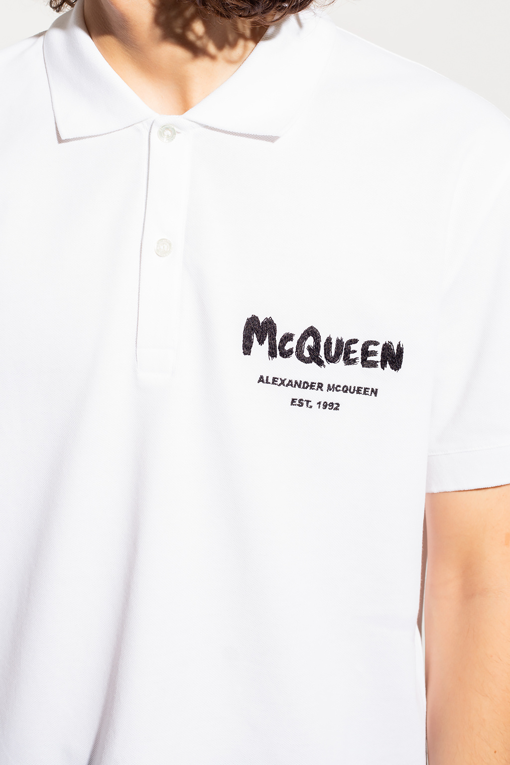 Alexander McQueen Polo de piqué de corte slim en negro de Lacoste