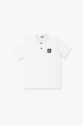 Basic polo with a woven label on wearers bottom hem