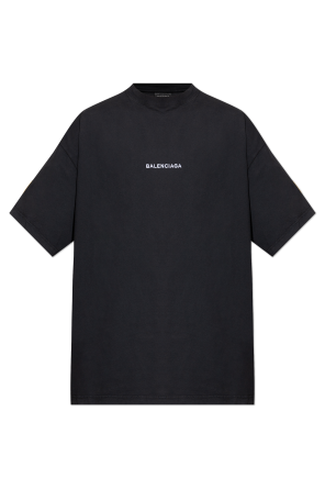 T-shirt with a patch on the sleeve