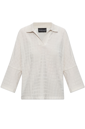 Polo de corte holgado