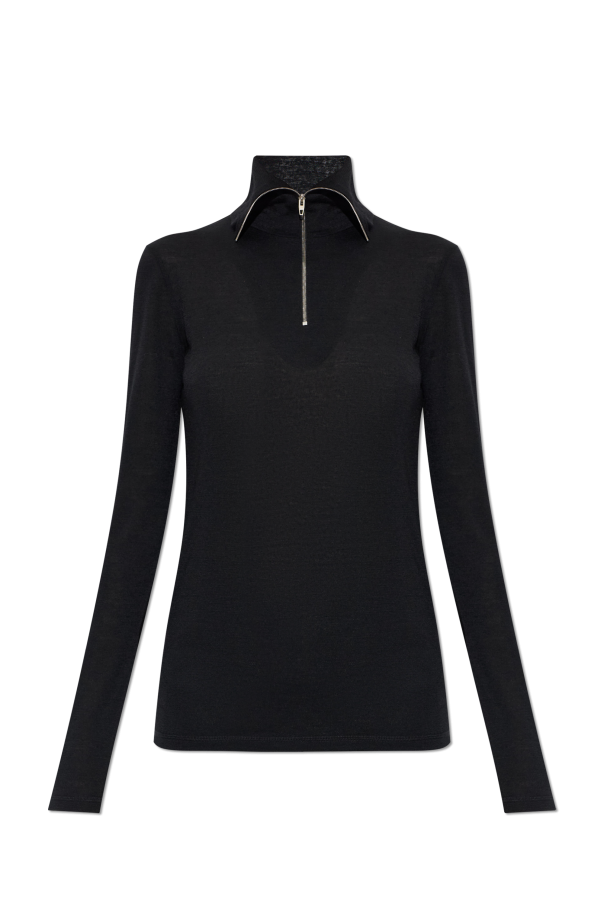 Top with a turtleneck od JIL SANDER