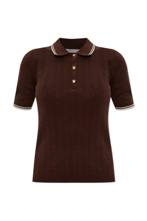 Polo con parche de logo