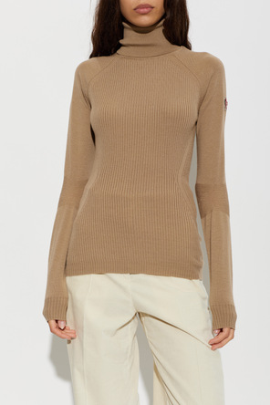 Moncler Grenoble Pulover Moncler Grenoble Apres-Ski pentru femei cu guler turtleneck bej-maro