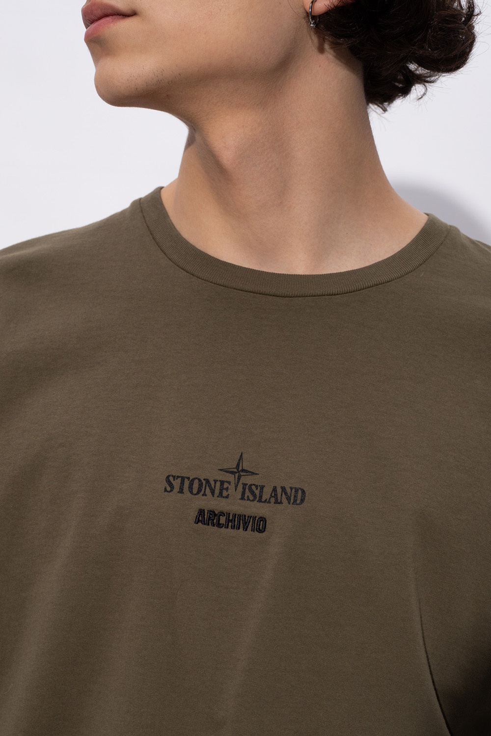 stone island upside down logo