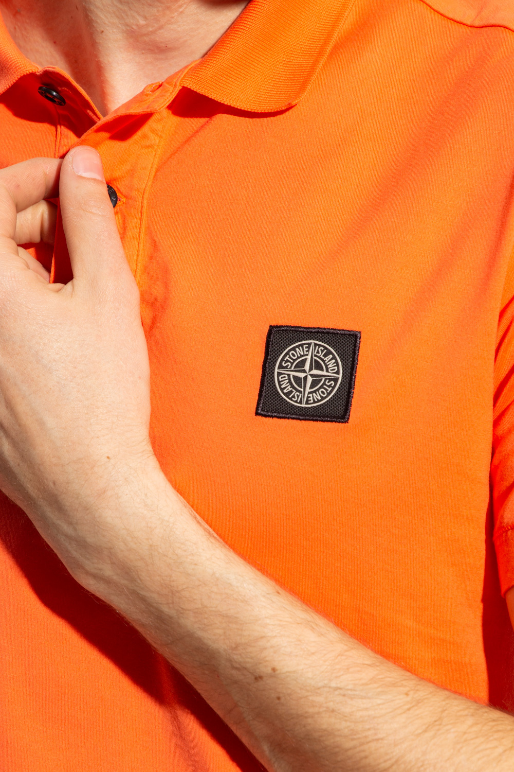 Stone Island The grey polo shirt is slightly smaller only 3-4 cms