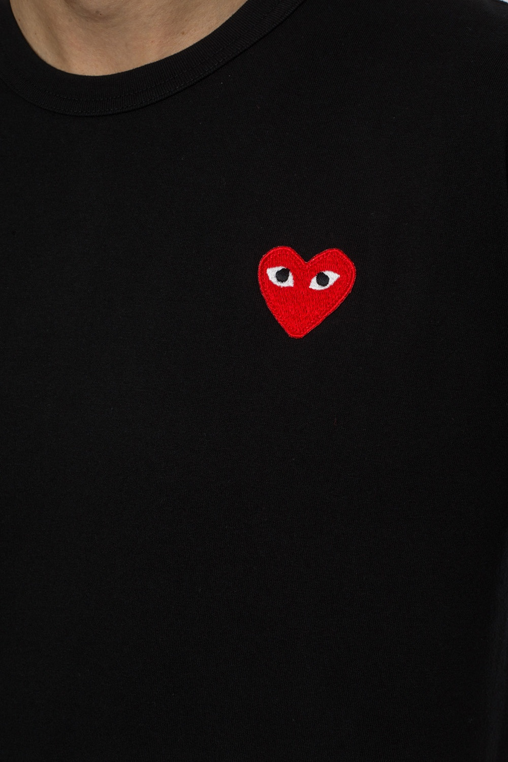Kanye West Wearing COMME des GARCONS PLAY Red Heart Tee