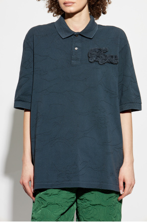 Lacoste Polo con logo desmontable