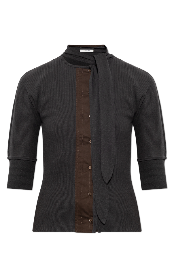Top with a decorative tie at the neckline od Lemaire