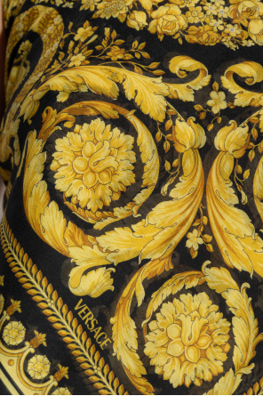 Versace Top asimétrico con espalda descubierta