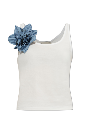 Turtleneck with a floral motif pin