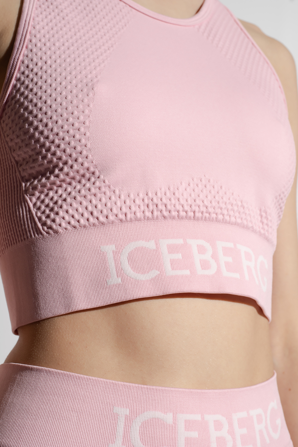 Iceberg Pink sports top from . This pair features a branded elastic waistband in white and ribbed crew neck