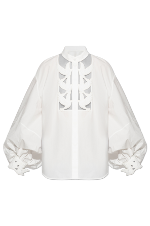 Shirt with a decoratively finished neckline