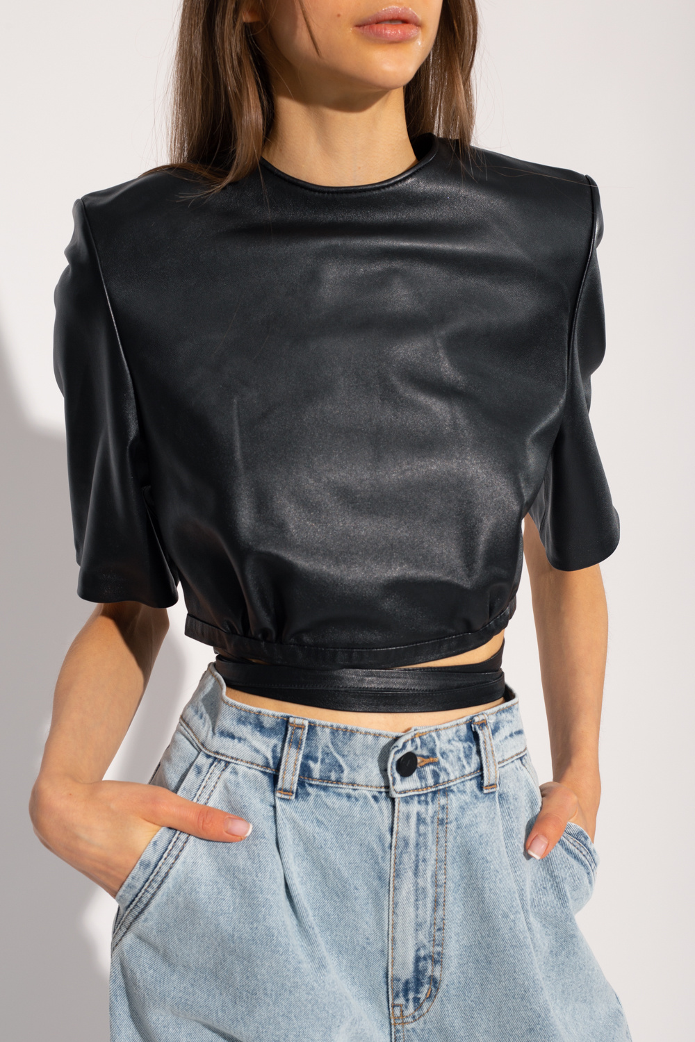 The Mannei ‘Atlass’ leather top with tie closure