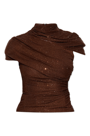 Top with shimmering appliqués