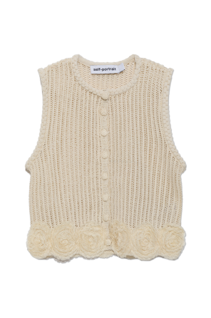 Top with lace appliqués