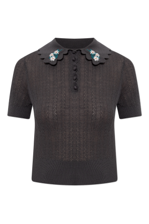 Polo with decorative embroidery on the collar