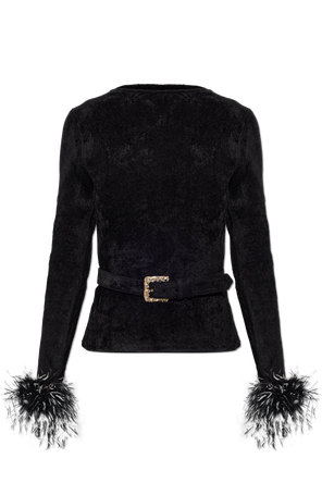 Top with ostrich feathers