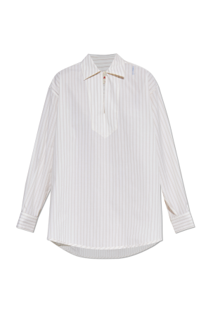 Top typu `oversize` ze wzorem w prążki