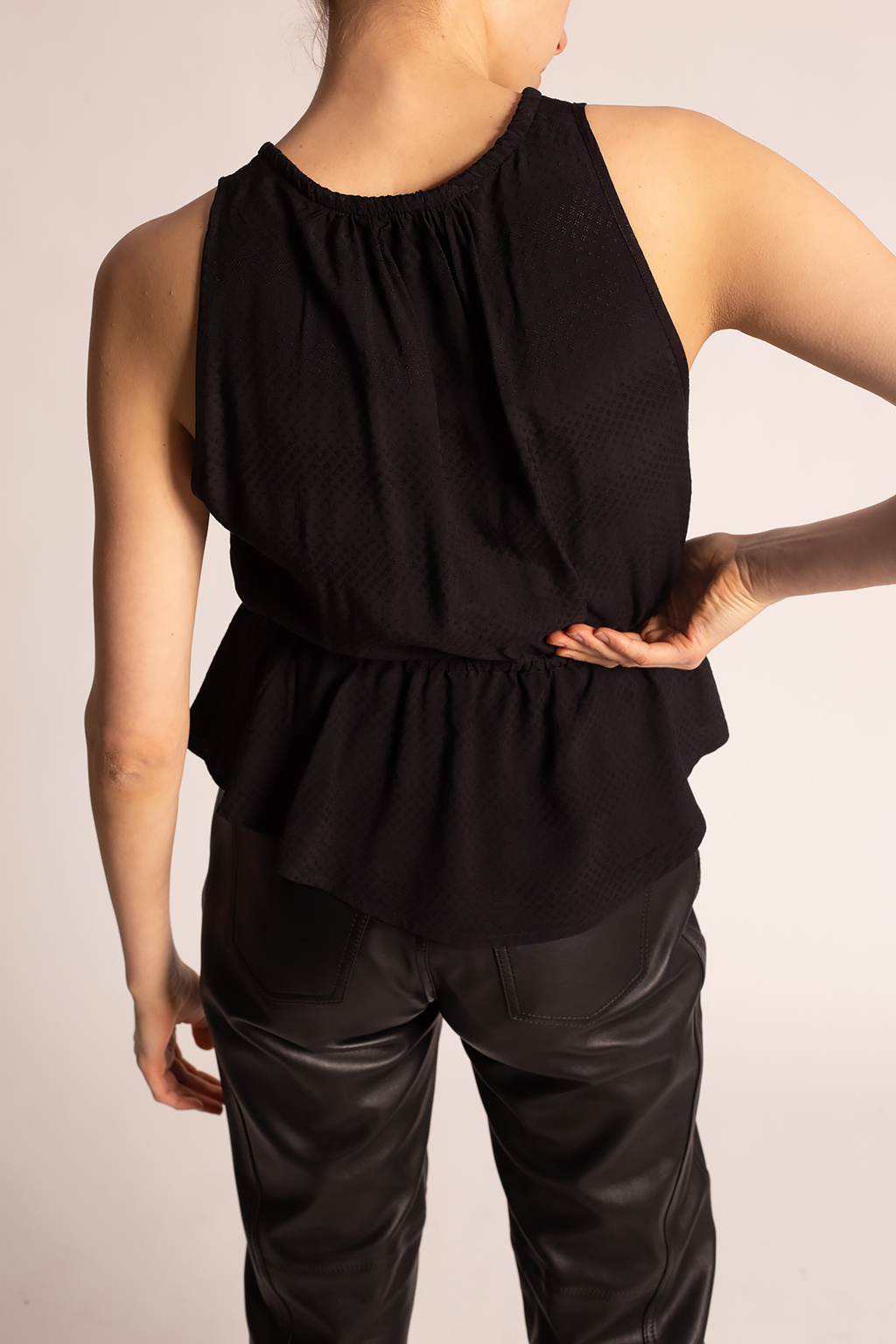 black ruffle sleeveless top