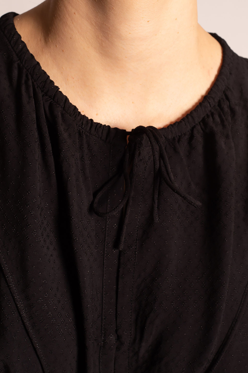 black ruffle sleeveless top